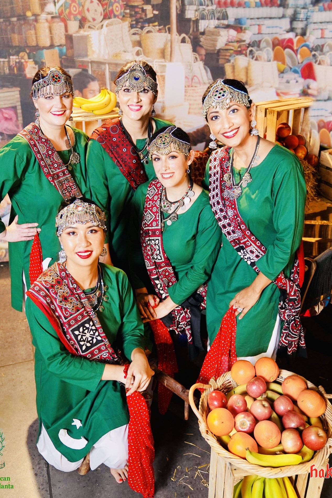 Sanam Studios Dancers with fruit cart market backdrop close-up