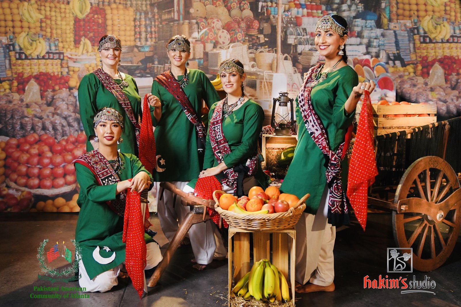 Sanam Studios Dancers with fruit cart market backdrop